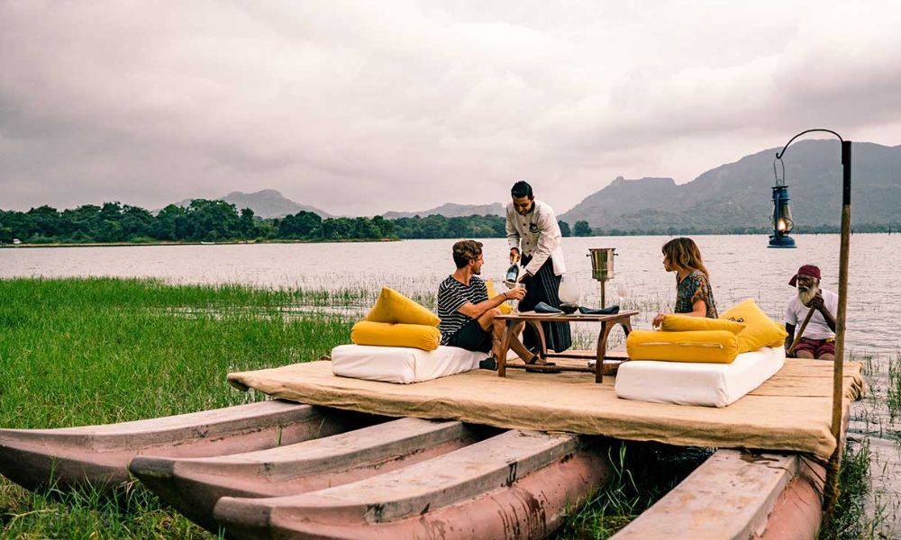 Dining-on-lake-side-Holiday-Packages-Sri-Lanka-Ceylon-Expeditions