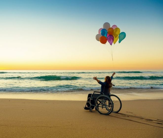 Tourist-on-wheel-chair-on-the-beach-Wheel-chair accessible-vacations-sri-lanka-and-maldives-ceylon-expeditions-sri-lanka